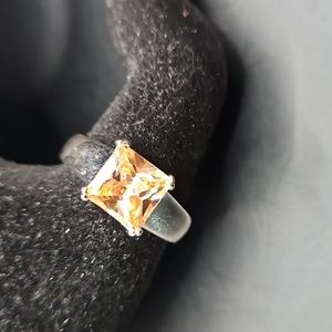 H-7 Silvertone ring with square yellow stone